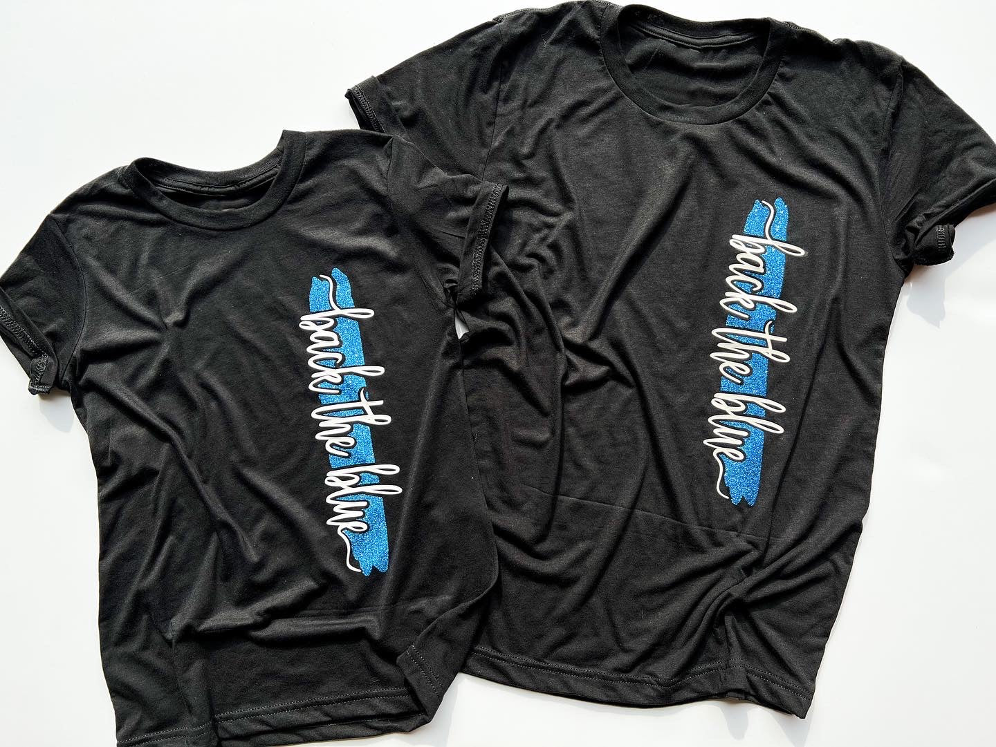 ADULT Back the blue cursive line - SOLID COLORS