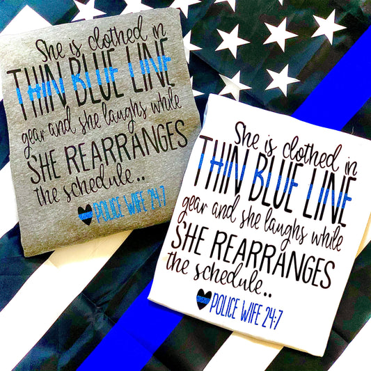 She is clothed in thin blue line gear - police wife